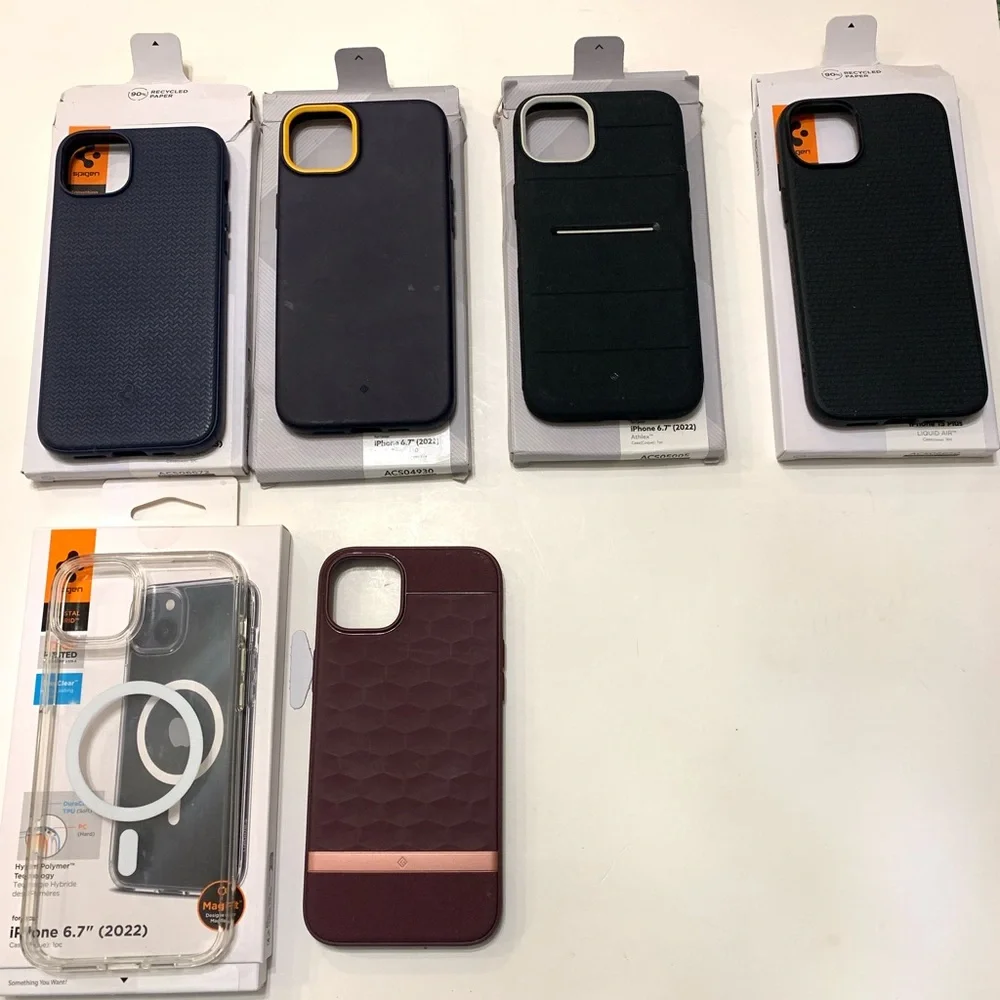 9 Assorted Spigen & Caseology iPhone 14 Plus and iPhone 15 Plus